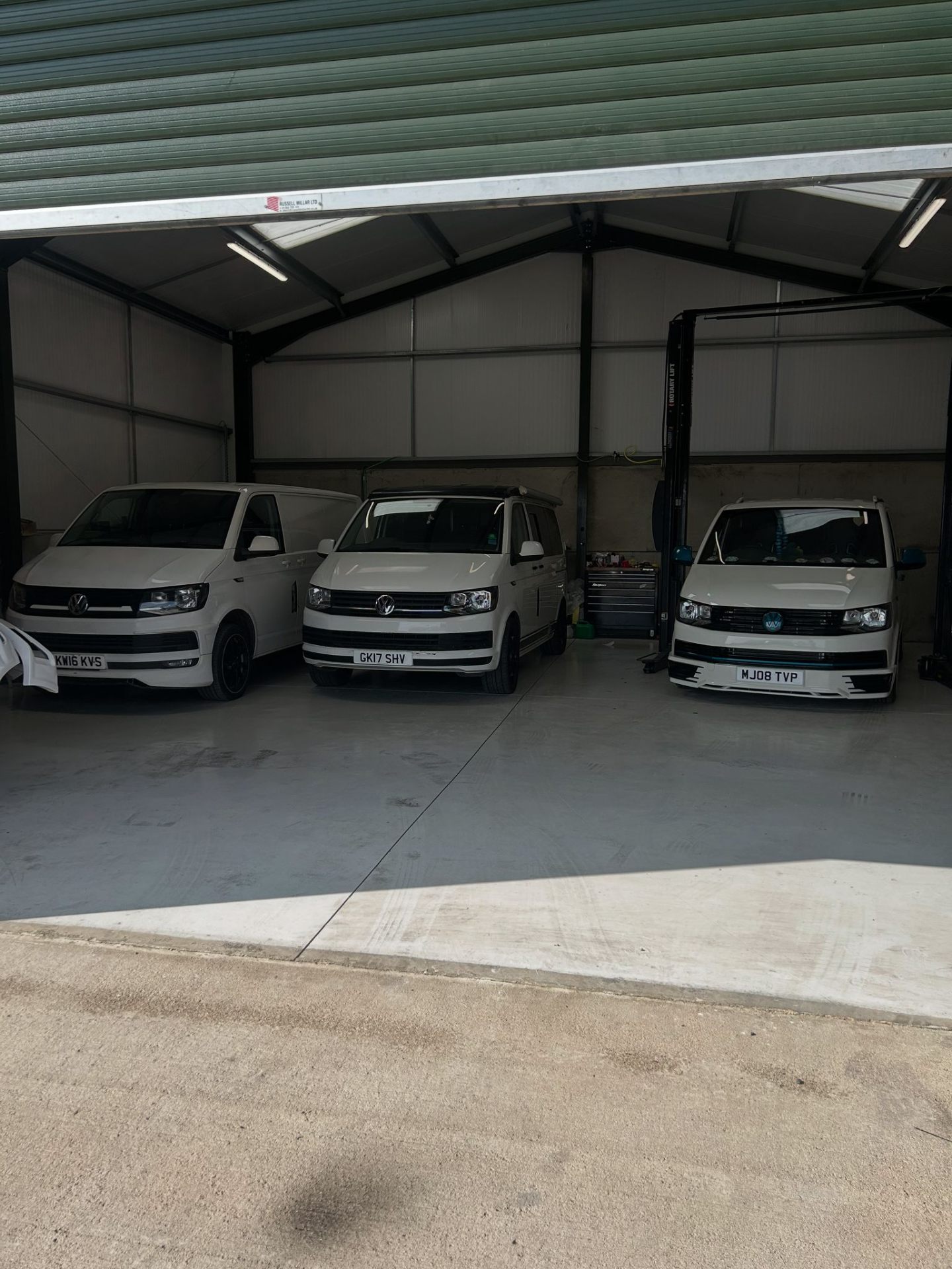 Three Transporters in the workshop bay
