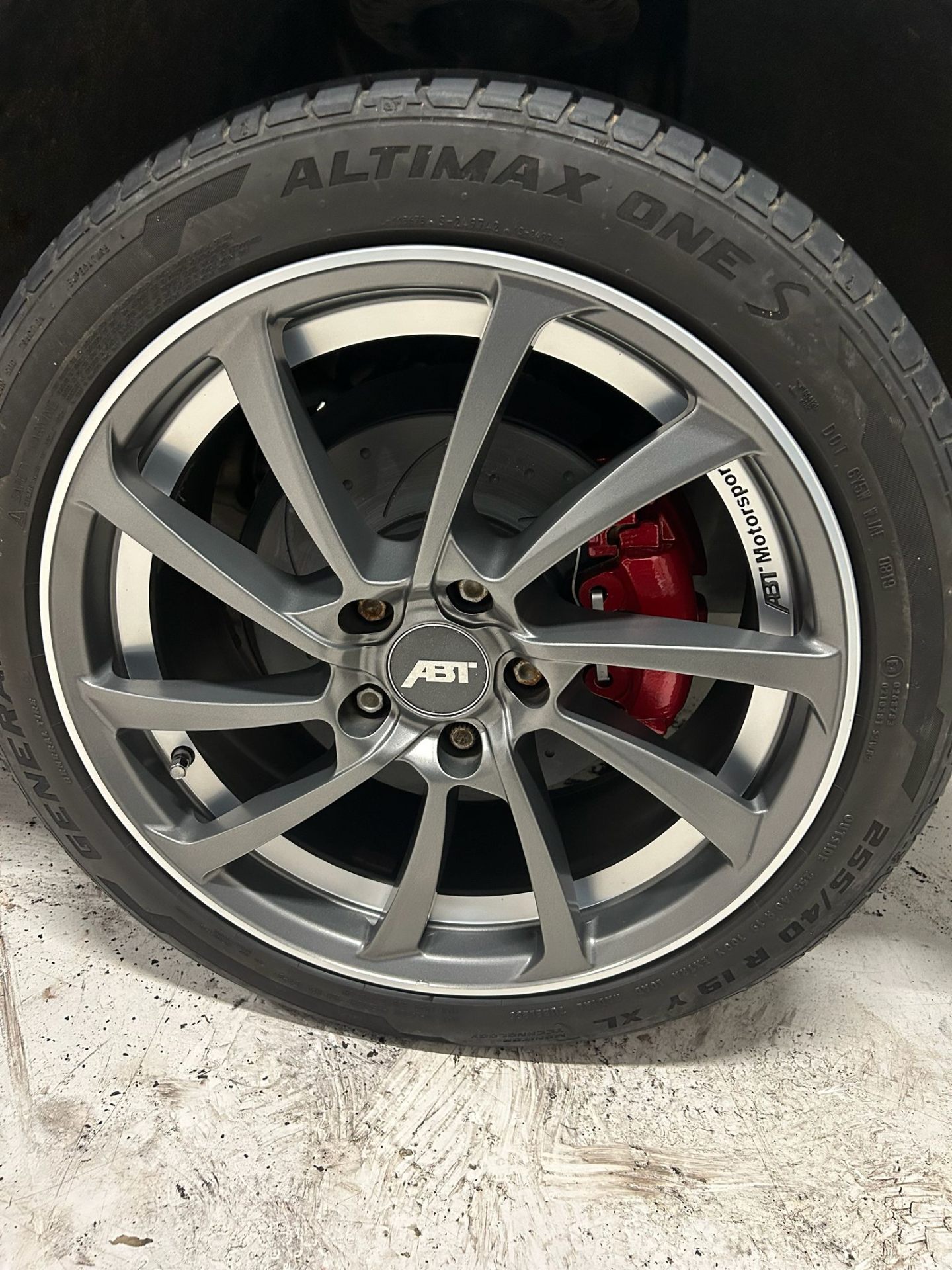 Caliper refresh — after (red, wheel refitted)